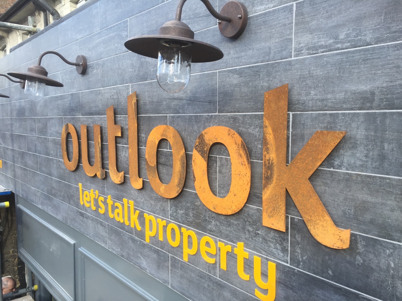 Outlook rusted metal signage