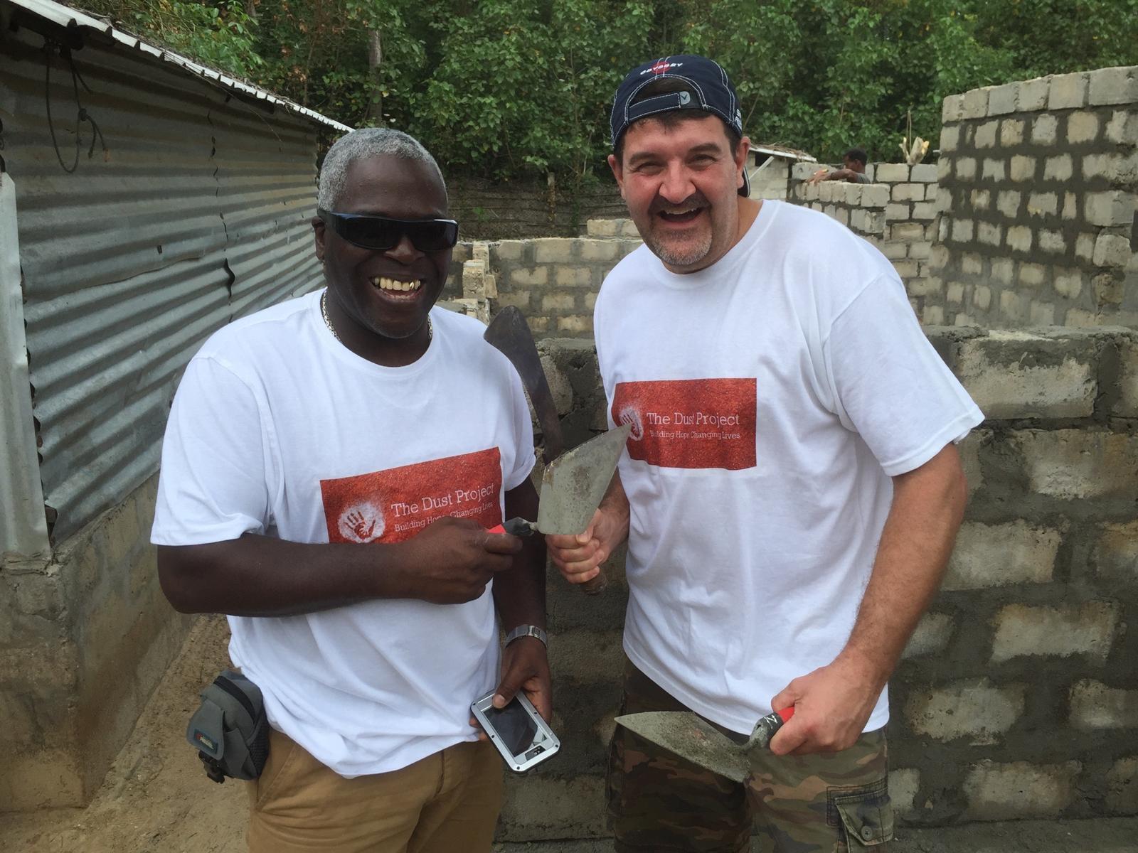 Volunteers building homes